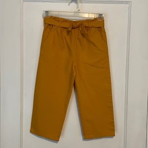 NWOT Girls OshGosh paper bag slacks. Golden color. Size 5.